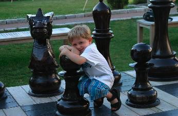 children and life size chess