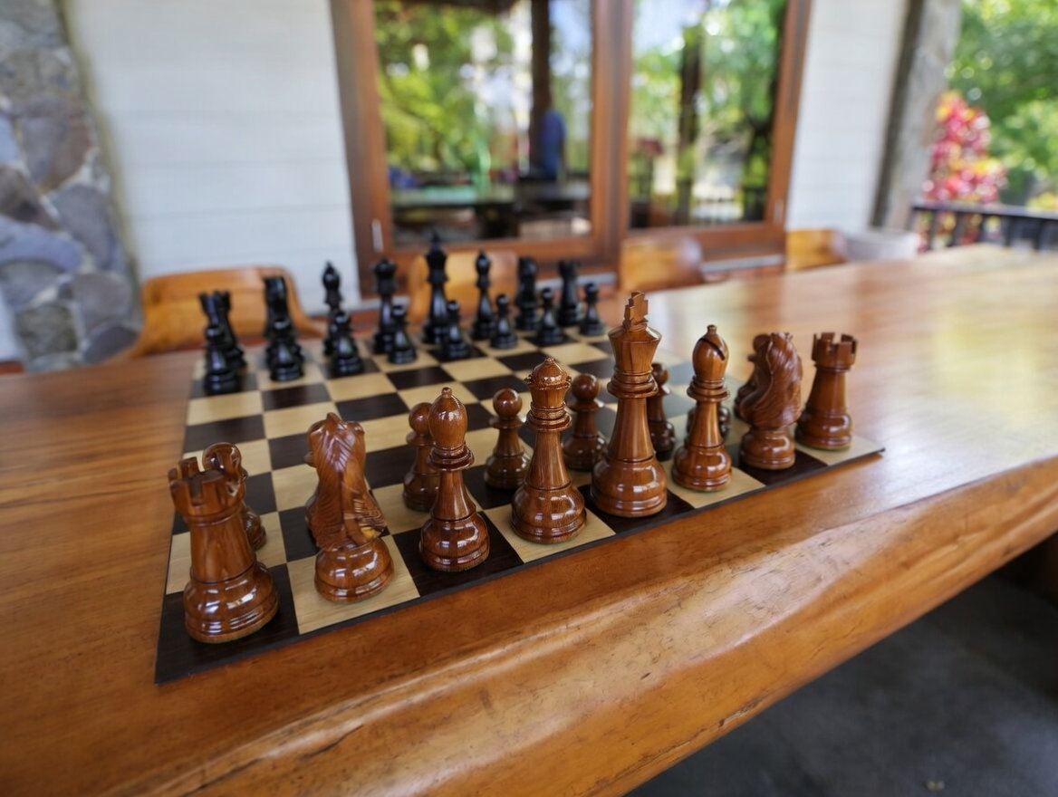 Elegant Outdoor Chess Collection oversized outdoor chess set in luxury tropical resort environment