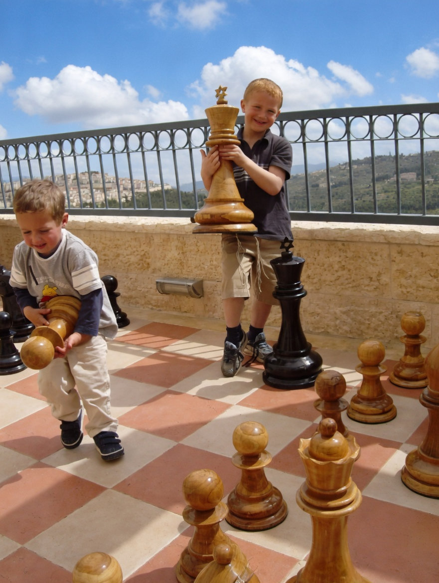 Tropical Giant Chess Escape oversized outdoor chess set in luxury tropical resort environment