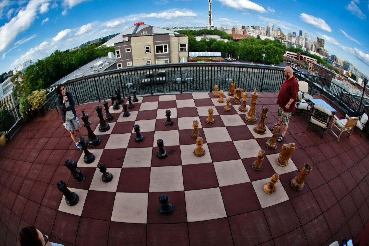 Luxury Resort Giant Chess Experience oversized outdoor chess set in luxury tropical resort environment