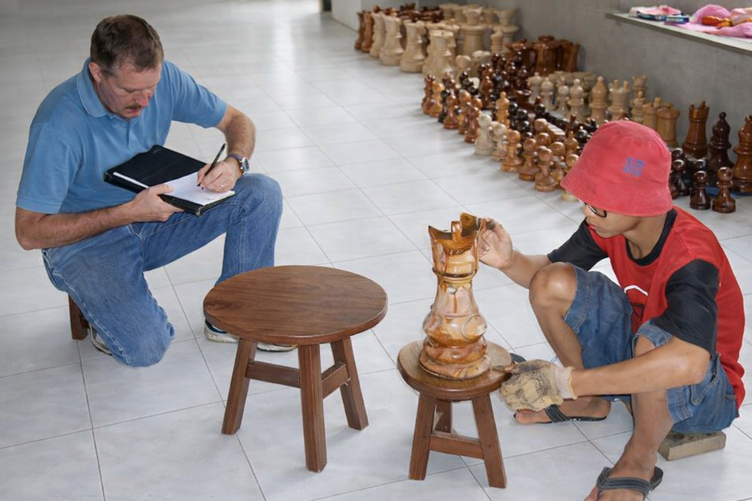 Modern Luxury Chess Lifestyle oversized outdoor chess set in luxury tropical resort environment