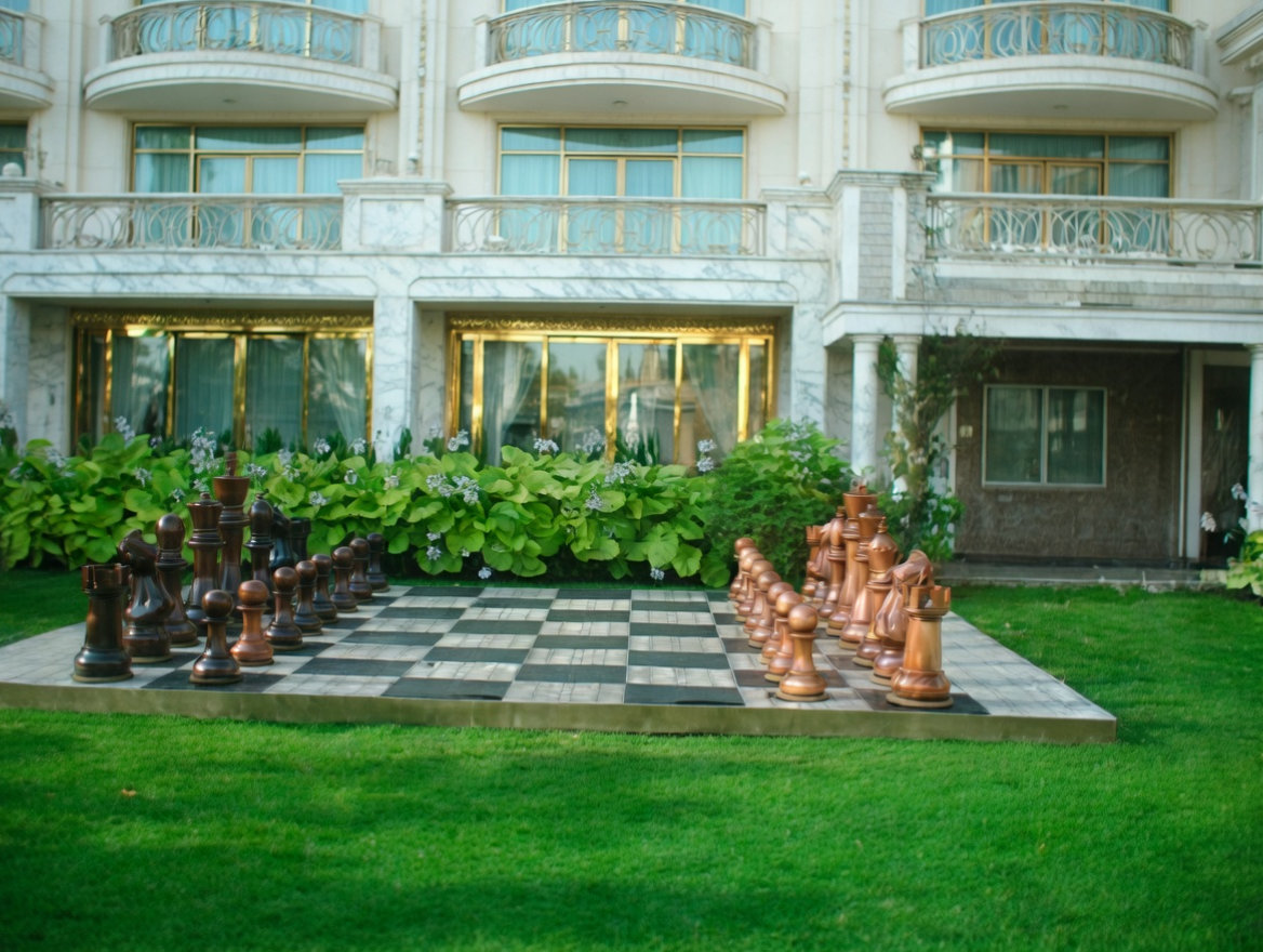 Luxury Resort Giant Chess Experience oversized outdoor chess set in luxury tropical resort environment