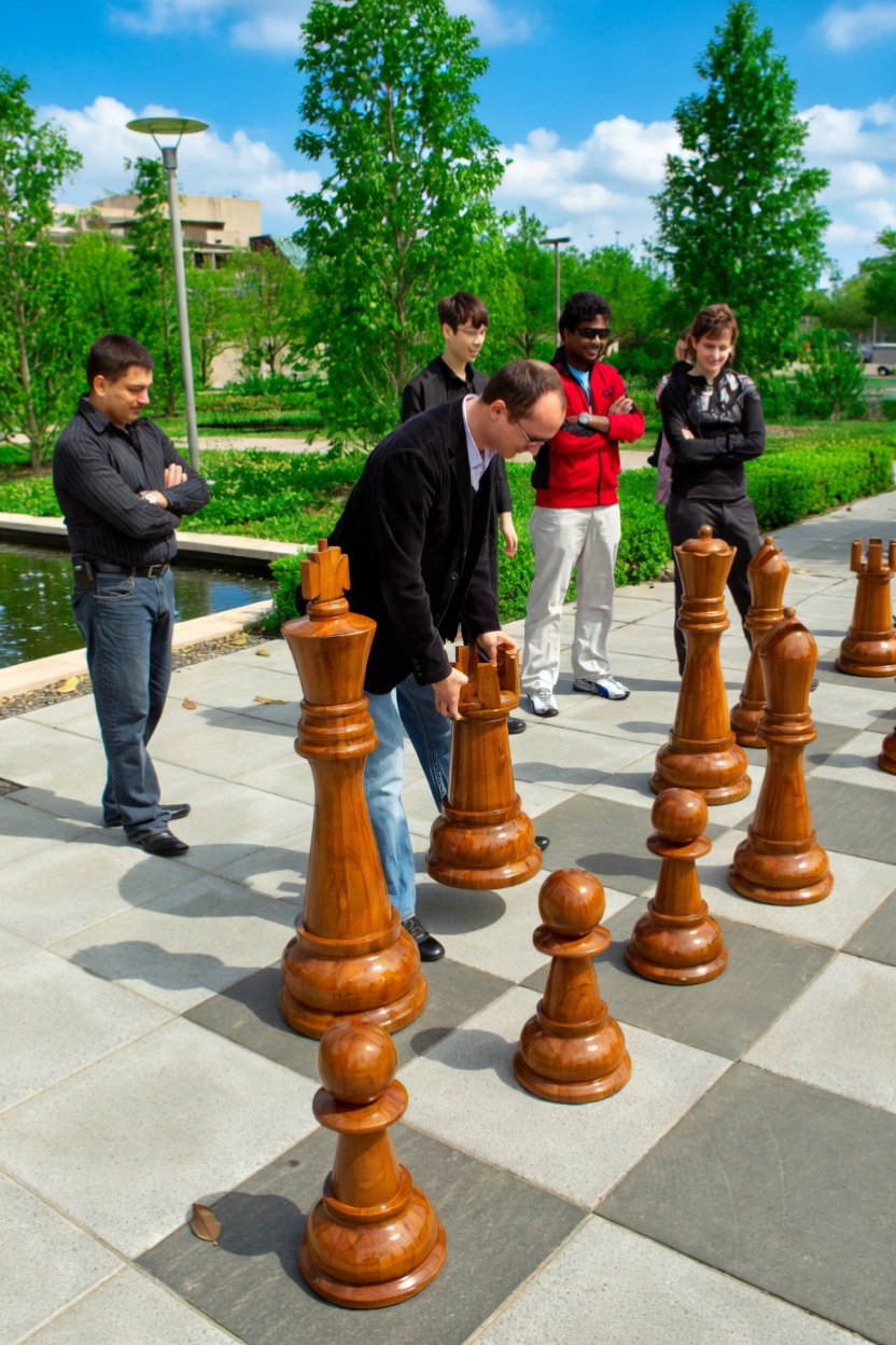 Architectural Giant Chess Design oversized outdoor chess set in luxury tropical resort environment