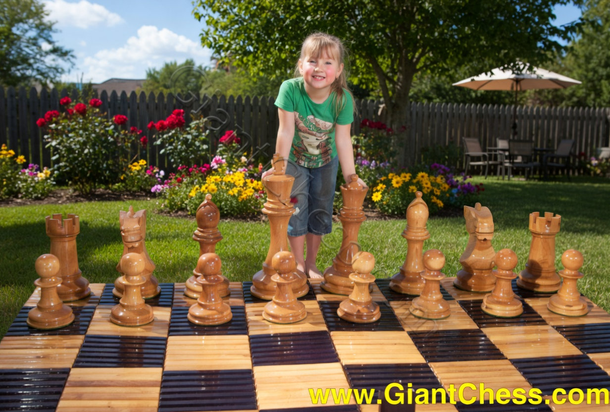 Premium Garden Chess Installation oversized outdoor chess set in luxury tropical resort environment