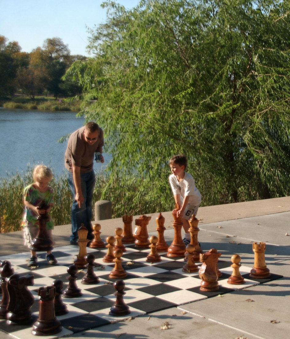 Tropical Giant Chess Escape oversized outdoor chess set in luxury tropical resort environment