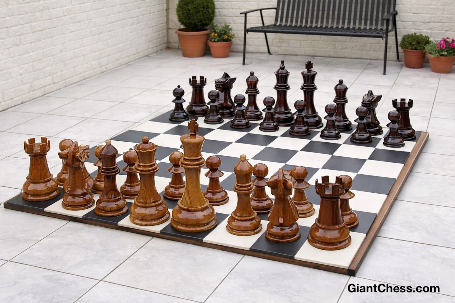 Premium Garden Chess Installation oversized outdoor chess set in luxury tropical resort environment