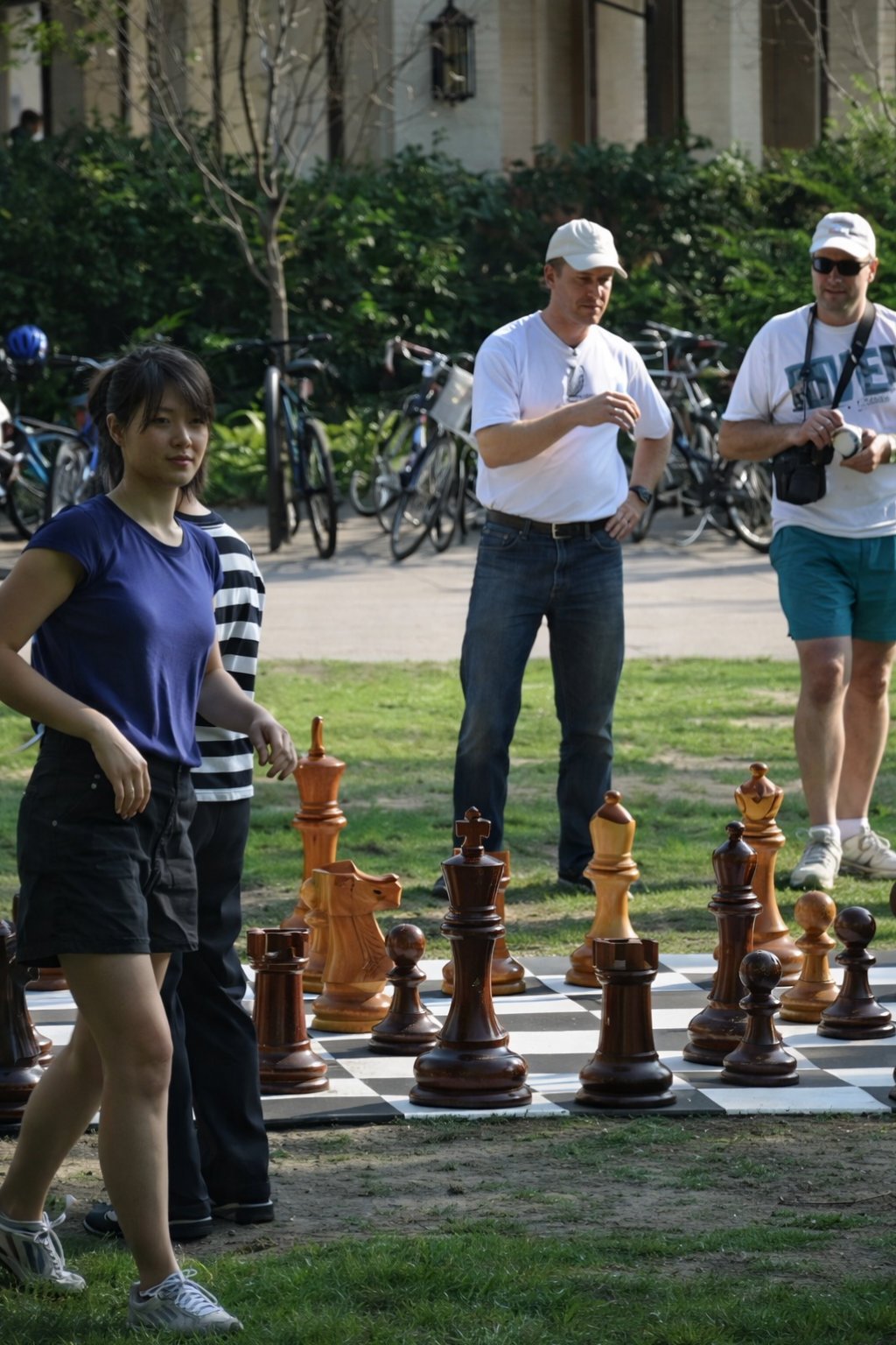 Premium Garden Chess Installation oversized outdoor chess set in luxury tropical resort environment
