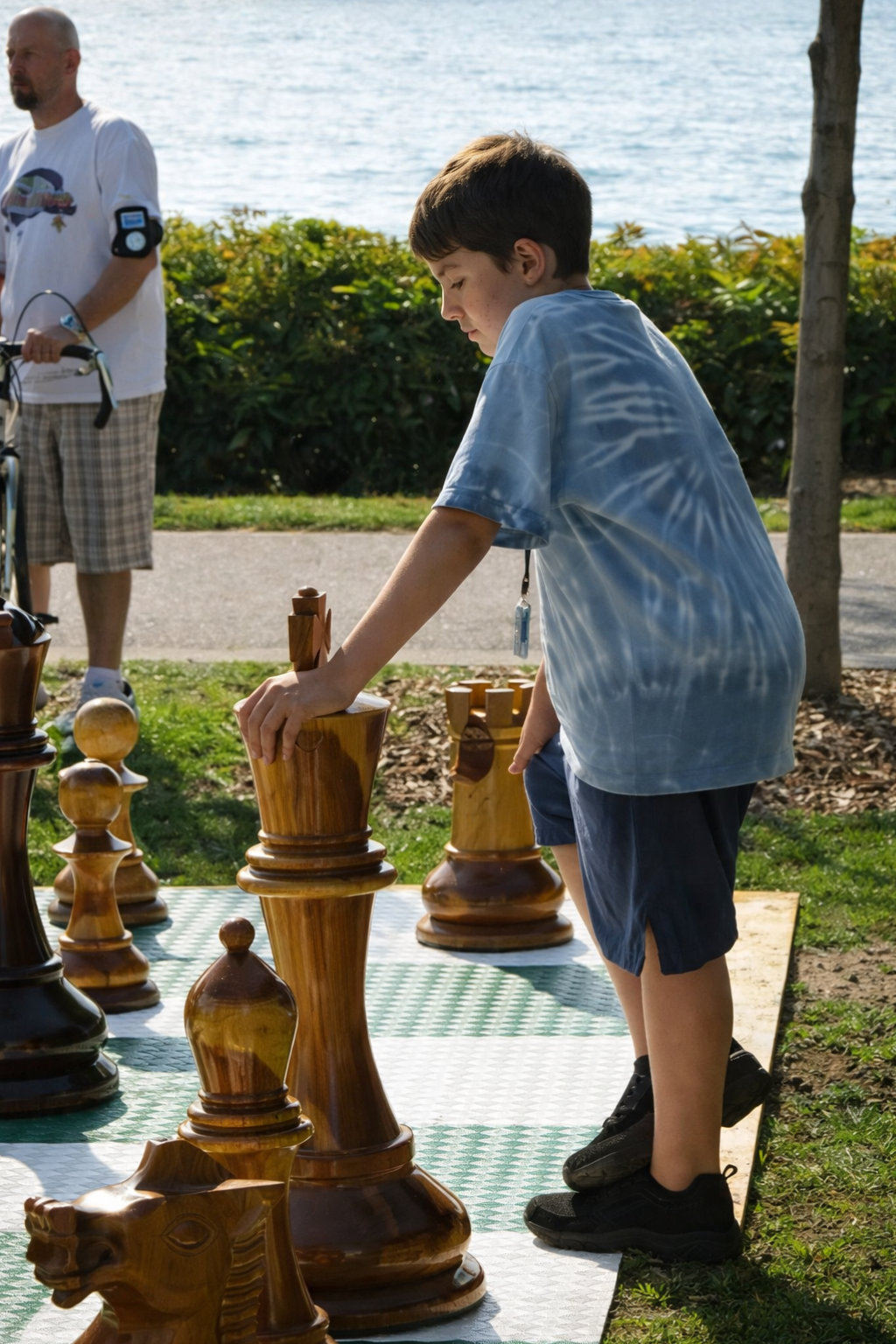 Exclusive Giant Chess Gallery oversized outdoor chess set in luxury tropical resort environment