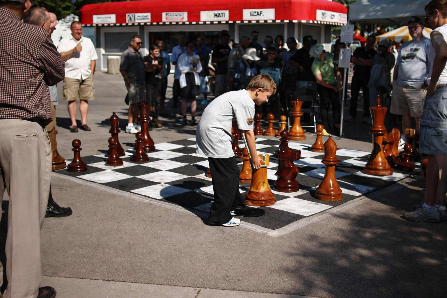 Tropical Giant Chess Escape oversized outdoor chess set in luxury tropical resort environment