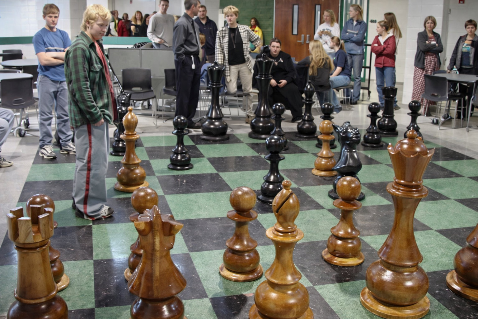 Modern Luxury Chess Lifestyle oversized outdoor chess set in luxury tropical resort environment