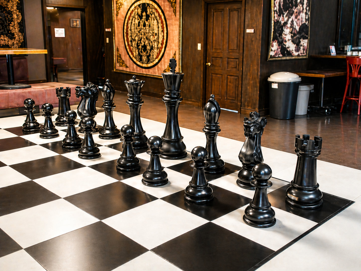 Exclusive Giant Chess Gallery oversized outdoor chess set in luxury tropical resort environment