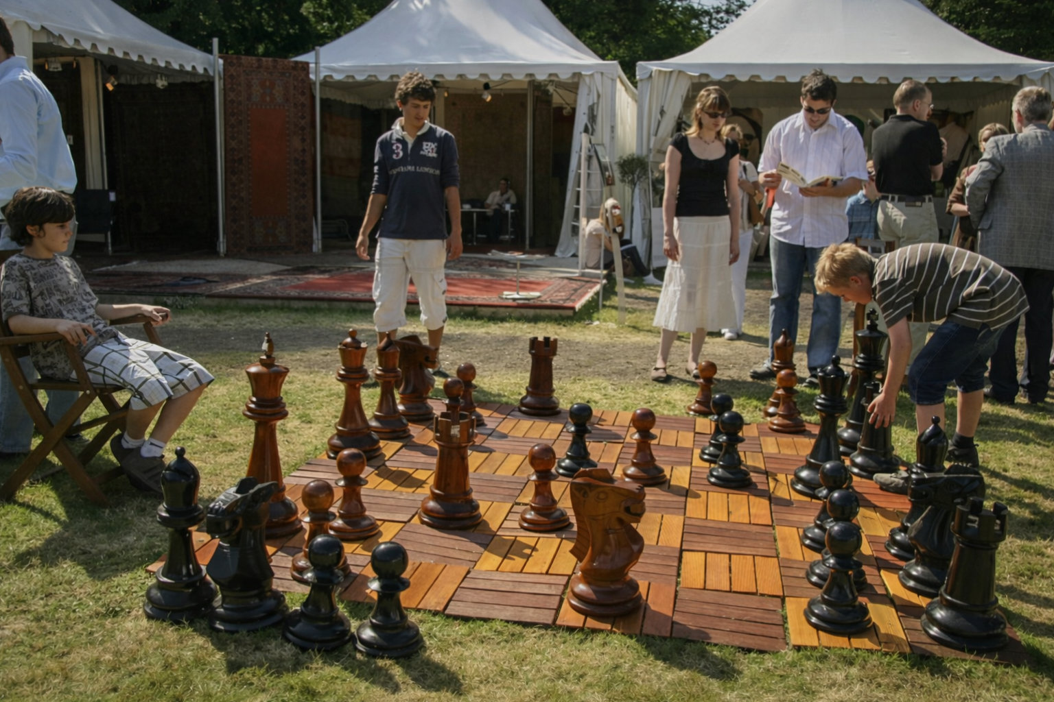 Premium Garden Chess Installation oversized outdoor chess set in luxury tropical resort environment