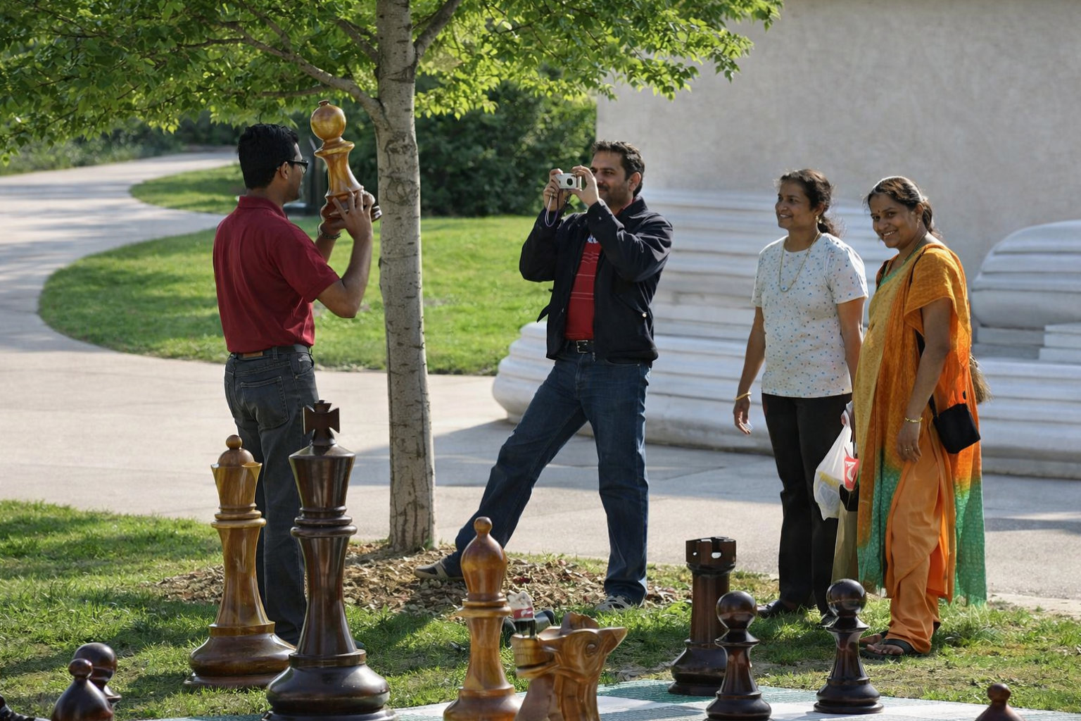 Exclusive Giant Chess Gallery oversized outdoor chess set in luxury tropical resort environment