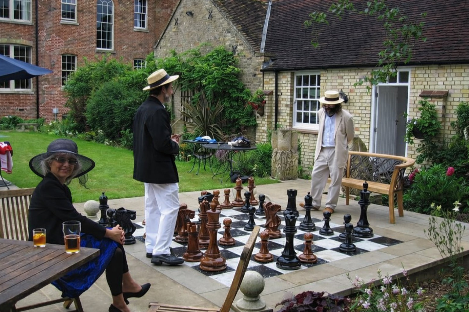 Elegant Outdoor Chess Collection oversized outdoor chess set in luxury tropical resort environment
