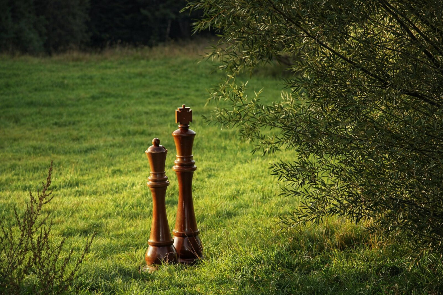 Premium Garden Chess Installation oversized outdoor chess set in luxury tropical resort environment
