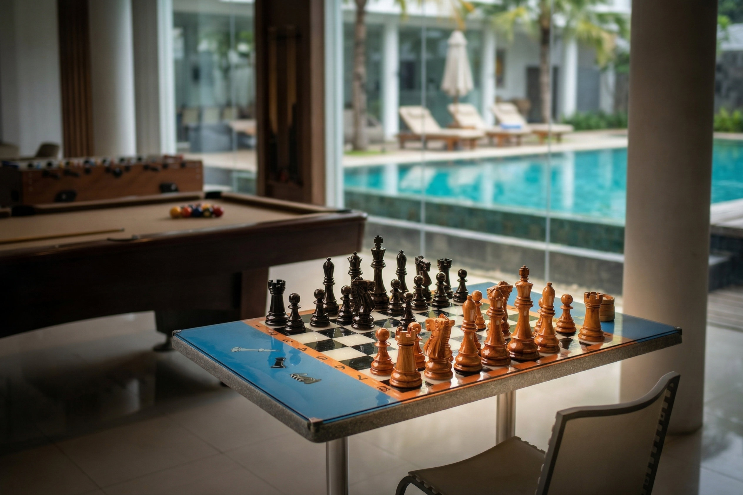 Tropical Giant Chess Escape oversized outdoor chess set in luxury tropical resort environment