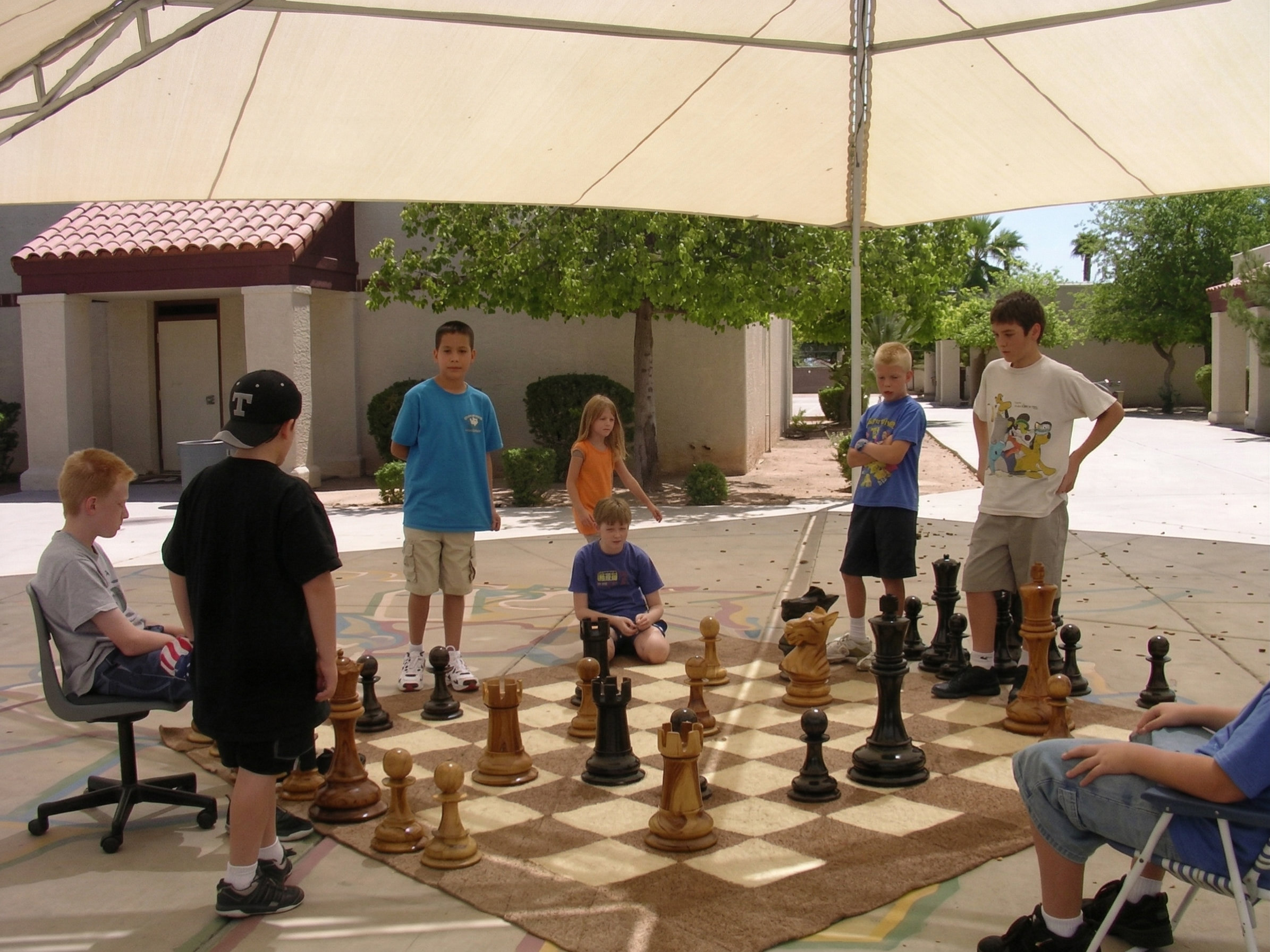 Handcrafted Giant Chess Showcase oversized outdoor chess set in luxury tropical resort environment