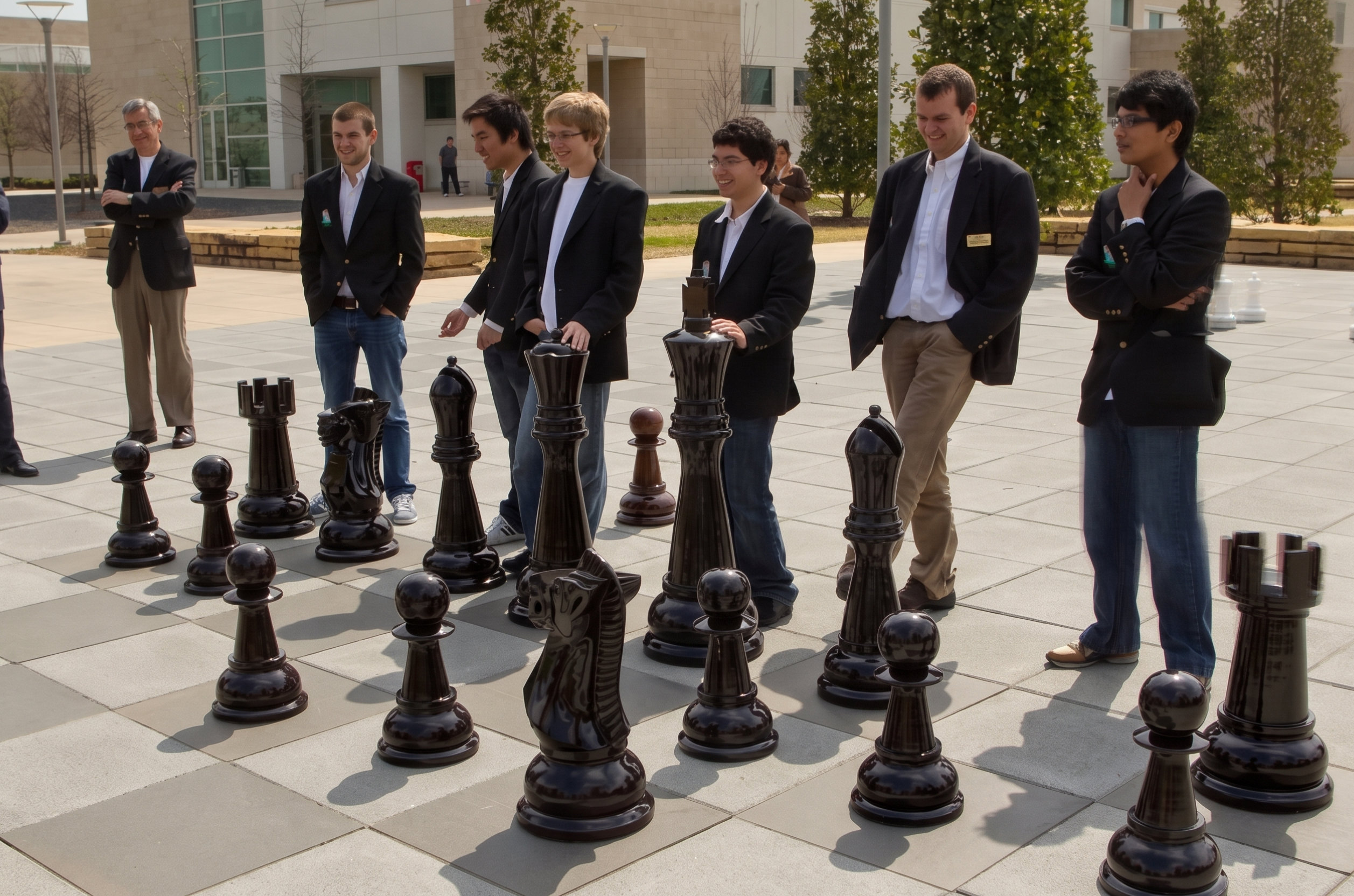 Handcrafted Giant Chess Showcase oversized outdoor chess set in luxury tropical resort environment