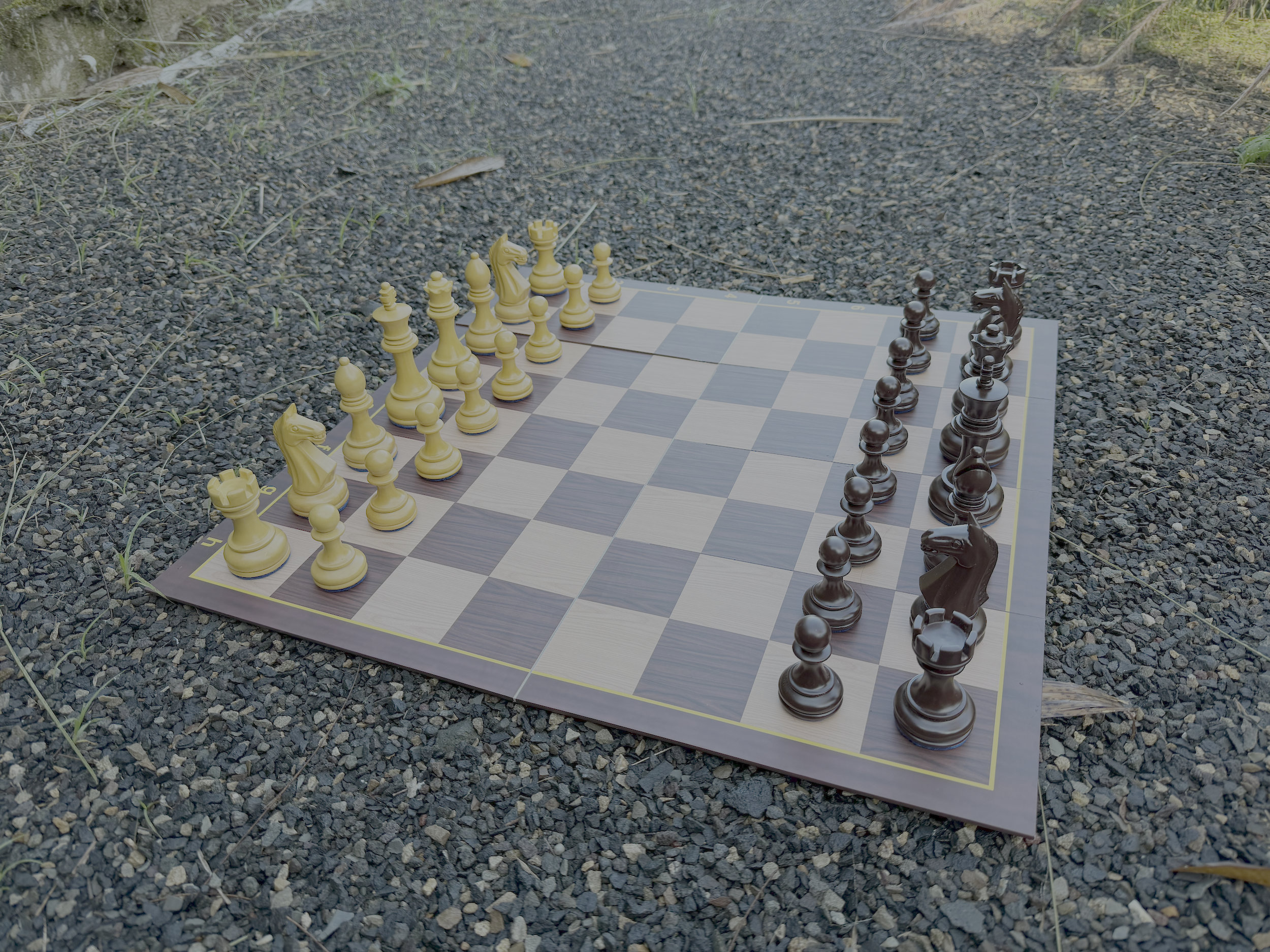 Modern Luxury Chess Lifestyle oversized outdoor chess set in luxury tropical resort environment