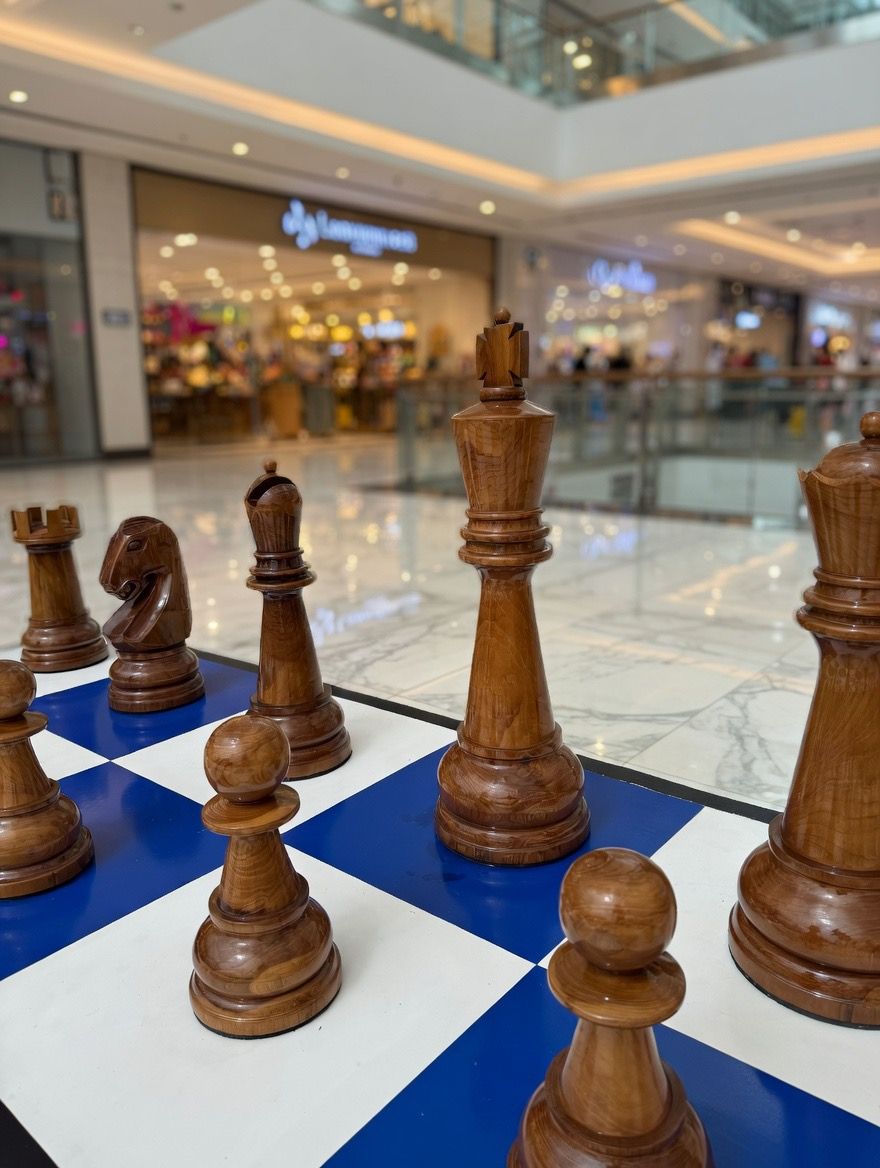 Thumbnail for Checkmate in Style_ How Giant Teak Chess Sets Are Redefining Urban Mall Experiences